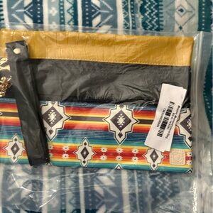 New Leather Geometric Women's Clutch
Purchased at The Sister’s Boutique